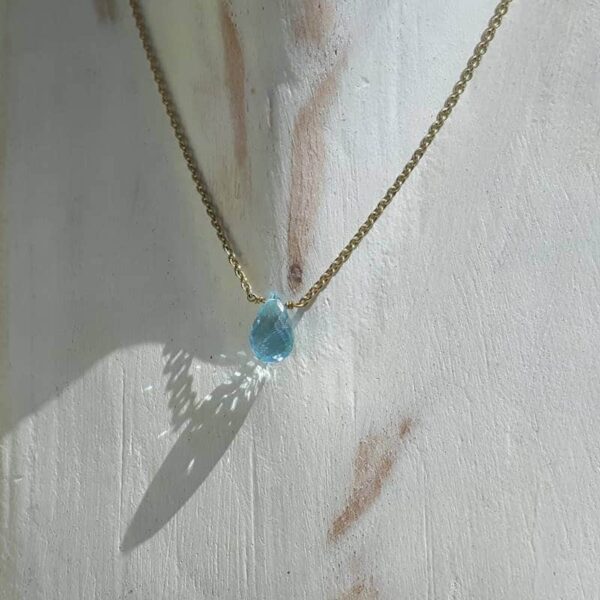 Collier topaze bleue doré