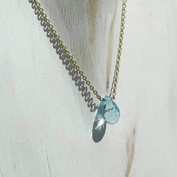 Collier topaze bleue doré