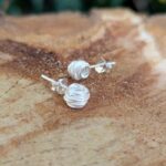 Clous d'oreilles artisanales nid d'argent