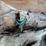 Mini créoles dorées turquoise Om